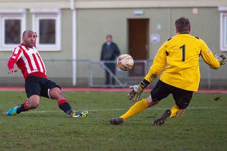 1/03/2014 Guildford City v Bishops Cleeve at the Spectrum.  A 6 pointer at the bottom of the table clash. Shortly after scoring LANCE BANTON-BROWN nearly doubled City's lead [Pic Paul Burgman]