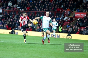 16/12/2017. Brentford FC v Barnsley FC. SkyBet Championship Football Action from Griffin Park Brentford's Neal MAUPAY